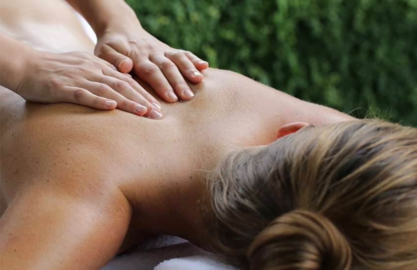 A lady enjoying the Aspen Spa Signature massage